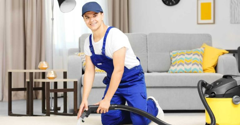 jhonny cleaning carpet with a carpet cleaner