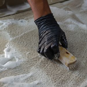 washing carpet with soap
